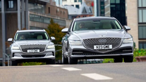 Two silver Genesis cars drive on a city street, HD Desktop Wallpaper
