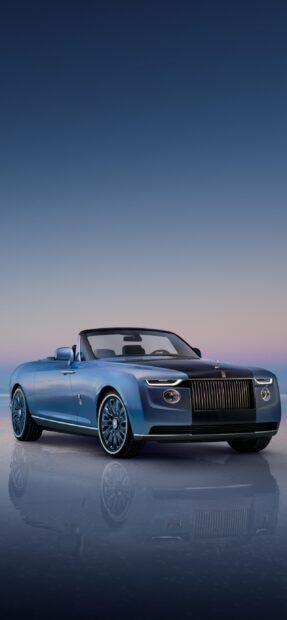 A blue Rolls Royce Dawn convertible is parked on a reflective surface during twilight, 2K Phone Wallpaper
