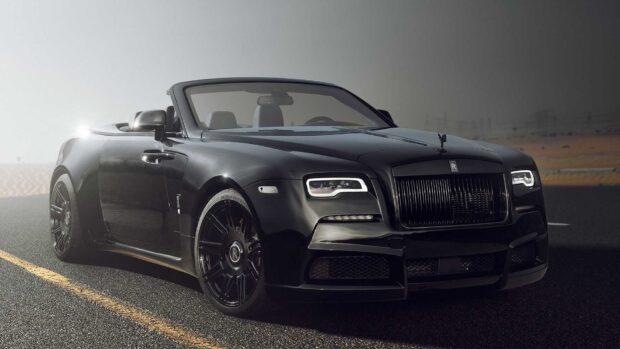 A black Rolls Royce Dawn captures elegance and power on an open road during dusk, HD Desktop Wallpaper