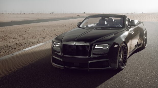 A black Rolls Royce Dawn is parked on a desert road under a clear sky, 4K Desktop Wallpaper