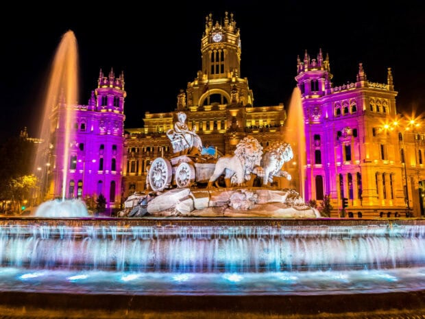 The Spain fountain shows intricate statues and flowing water under vibrant night lighting, HD Desktop Wallpaper