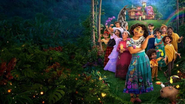 The Encanto family poses together in a lush forest setting with fireflies and colorful wildlife, HD Desktop Wallpaper