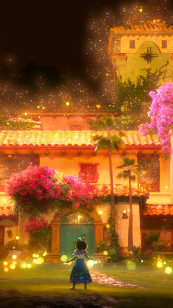 A girl stands in front of a bright house surrounded by glowing lights and flowers in Encanto Wallpapers, HD Phone Wallpaper