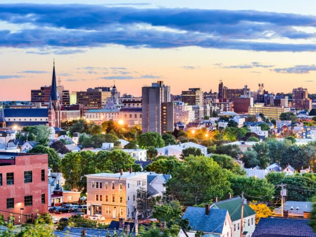 The Maine Wallpapers city skyline is captured during a colorful sunset, HD Desktop Wallpaper