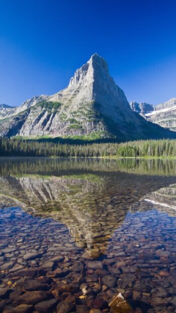 A majestic Montana mountain peak reflects clearly on the calm lake water, HD Mobile Wallpaper
