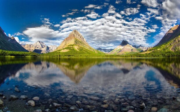 The Montana Wallpapers show clear lakes reflecting mountains under a blue sky, HD Desktop Wallpaper