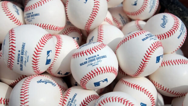 A collection of Major League Baseballs with visible logos and red stitching, 2K Desktop Wallpaper