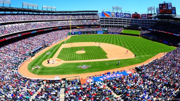 A crowd watches a Major League Baseball game at a packed stadium on a sunny day, HD Desktop Wallpaper