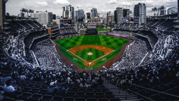 A crowded baseball stadium with a clear view of the field during a Major League Baseball game, 4K Desktop Wallpaper