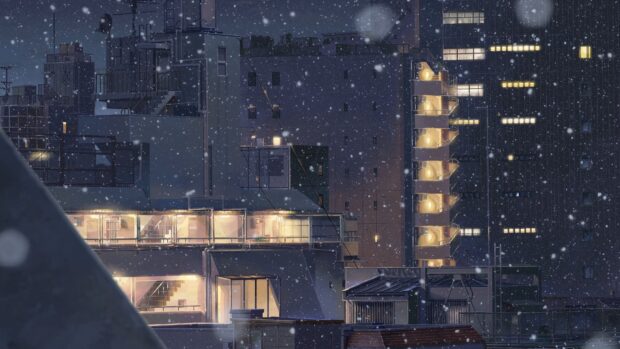 Quiet cityscape with snow falling on illuminated buildings in Makoto Shinkai style