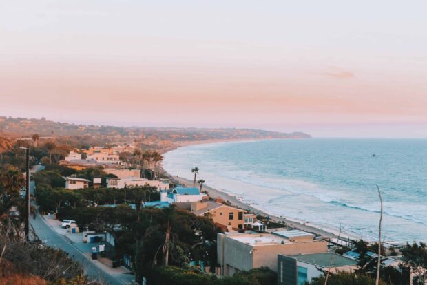 Coastal view of Malibu California at sunset with ocean and houses in HD quality