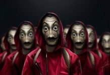 The image shows multiple masked characters in red hoodies inspired by Money Heist series, HD Desktop Wallpaper