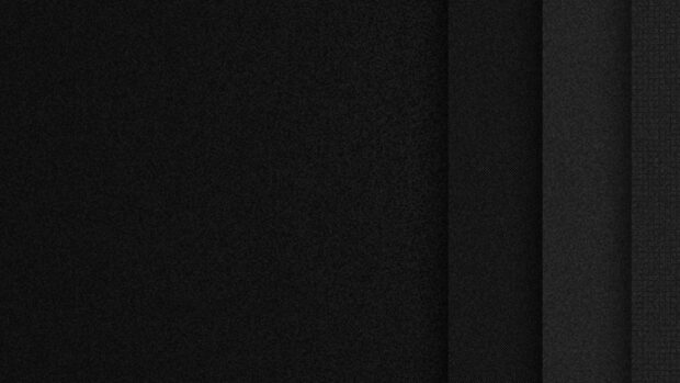 A close up of matte black textures showing different fabric patterns, 2K Desktop Wallpaper