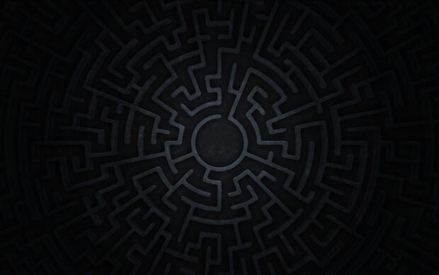 Dark circular maze design with intricate paths and a central empty space