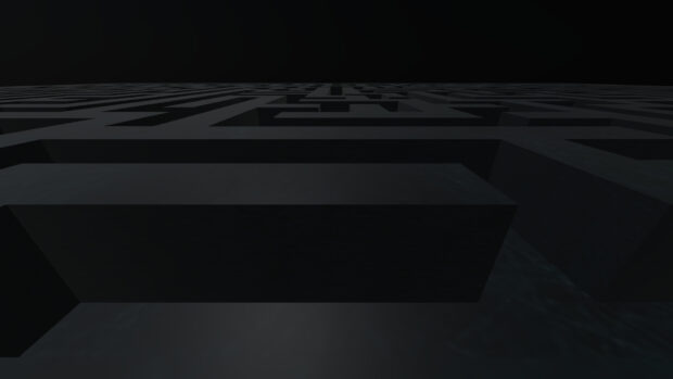 A dark maze structure with deep pathways and walls creating a complex maze design