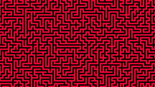 A complex maze design with black paths on a red background showing maze structure