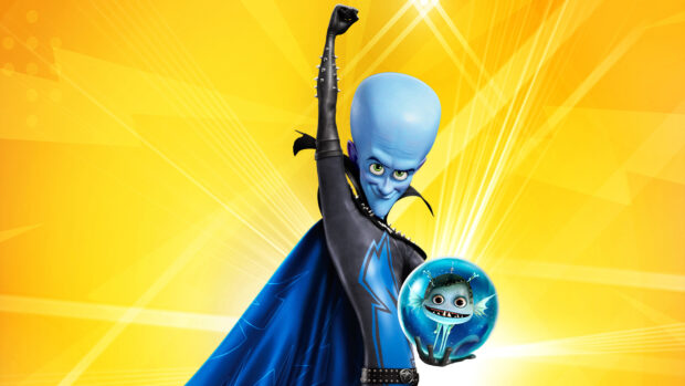 Megamind character with a large blue head wearing a black suit and holding a fish in a glass orb