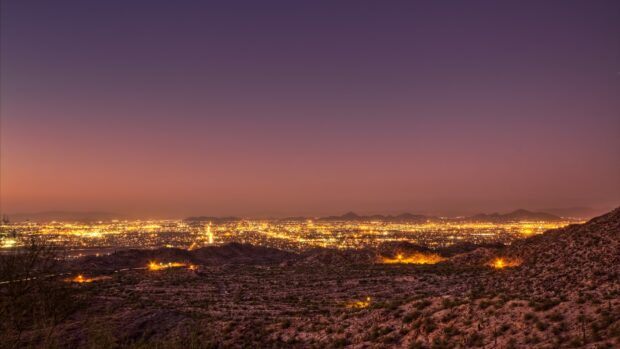 The Mexico City skyline shines brightly as dusk falls over the hills, HD Desktop Wallpaper