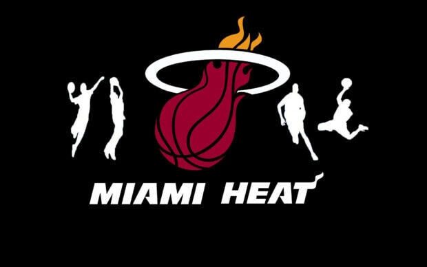 Miami Heat logo with basketball and player silhouettes in action representing Miami Heat