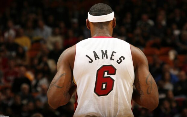 Back view of a Miami Heat player James wearing jersey number 6 on the basketball court