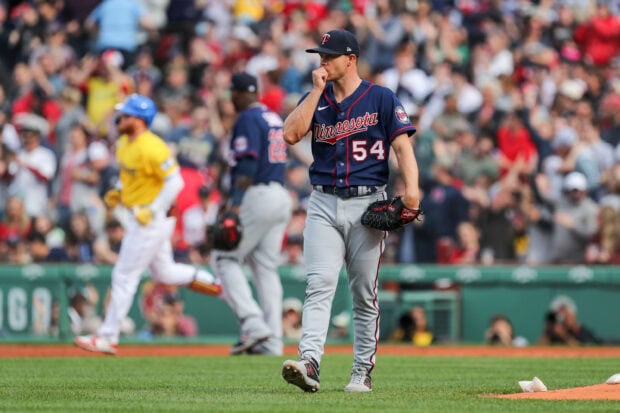 A Minnesota Twins player stands thoughtful during a baseball game, 2K Desktop Wallpaper