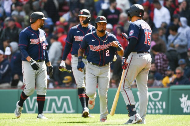 Minnesota Twins players celebrating on the baseball field during the game, 2K Desktop Wallpaper