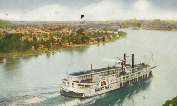 A steamboat named Saint Paul sails along the Mississippi River near a riverside town, HD Desktop Wallpaper