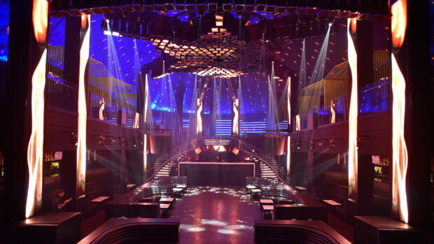 The nightclub features colorful lights and a spacious dance floor, HD Desktop Wallpaper