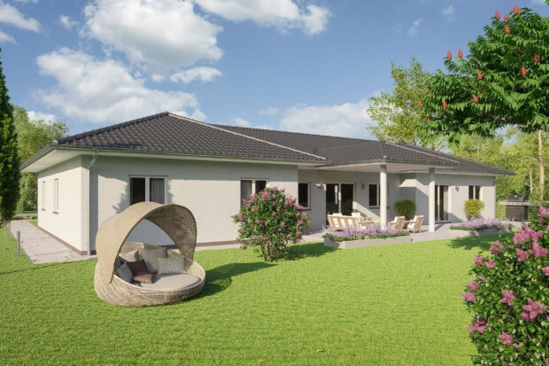 A modern bungalow surrounded by green grass and flowering bushes under a blue sky, 2K Desktop Wallpaper