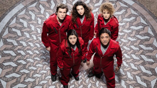 Five Money Heist characters stand together wearing red suits with a patterned floor beneath, 4K Desktop Wallpaper