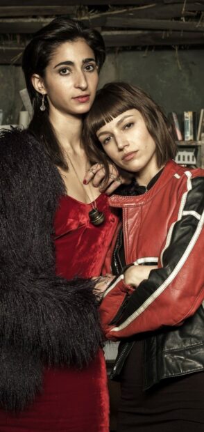 Two Money Heist characters pose closely together in a dimly lit room, HD Phone Wallpaper