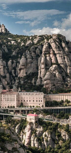 Montserrat mountain and monastery surrounded by rocky hills and greenery in Spain, HD Phone Wallpaper