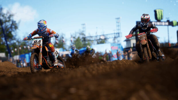 Two motocross riders are competing on a muddy dirt track during a race, 4K Desktop Wallpaper