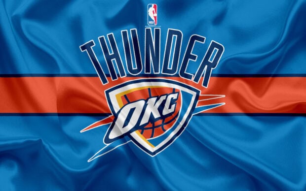 Close up of Oklahoma City Thunder logo on a blue basketball jersey fabric