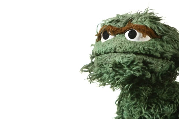 Oscar the Grouch from Sesame Street appears with a white background, 2K Desktop Wallpaper