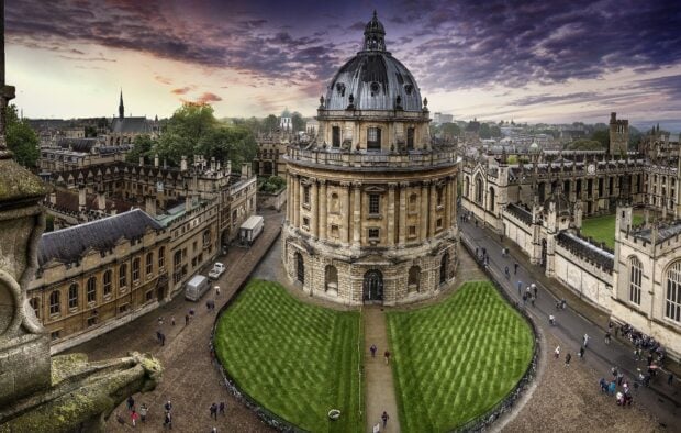 The Radcliffe Camera is a central landmark building at Oxford University with people walking nearby, HD Desktop Wallpaper
