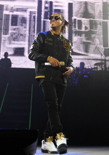 Ozuna Wallpapers captures the artist on stage during a live show, HD Desktop Wallpaper