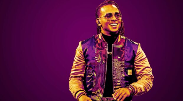Ozuna is wearing a vibrant jacket and glasses with a purple background, HD Desktop Wallpaper
