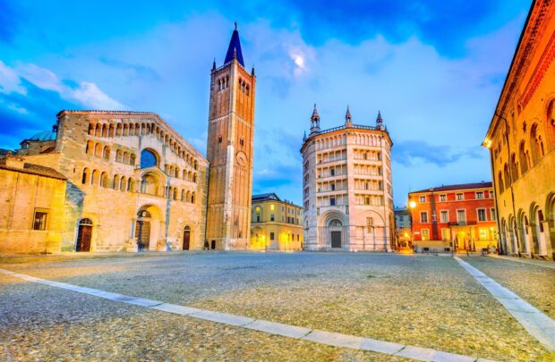 Historic architecture and towers in Parma Italy city center at twilight