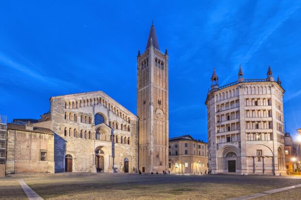 Historic Parma Italy architecture with cathedral tower at twilight