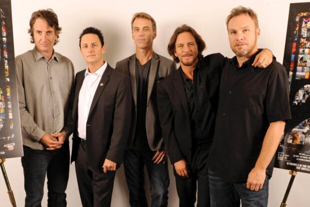 The Pearl Jam band members posing together in front of a white background, HD Desktop Wallpaper