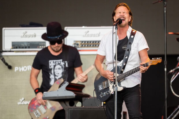 Pearl Jam performs energetically with guitar and keyboard during concert, HD Desktop Wallpaper