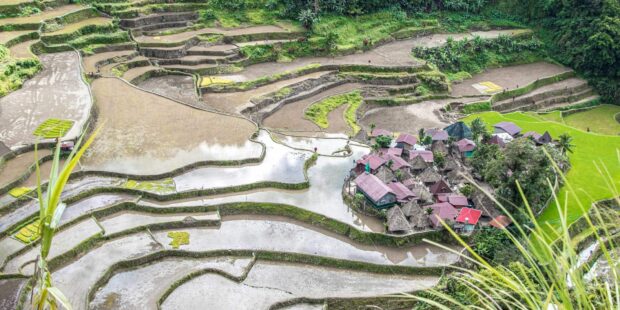 Traditional rice terraces and village in the mountains of Philippines