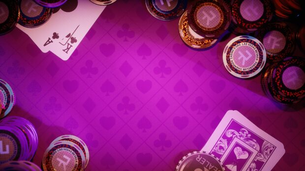 Purple poker table with poker chips and playing cards ace and king of clubs