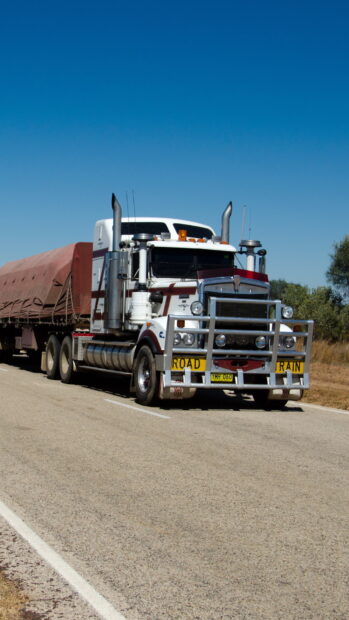 A Kenworth truck pulling a covered load on a clear sunny day, HD Mobile Wallpaper