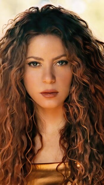 A close up portrait of Shakira with curly hair wearing a golden top in natural light, HD Phone Wallpaper