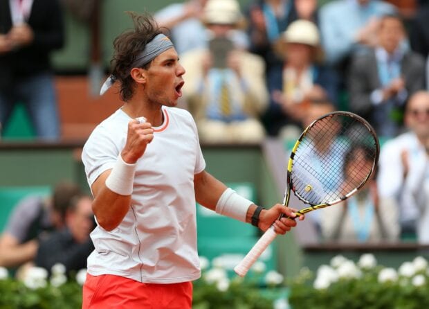 Rafael Nadal celebrating a point during a tennis match on the court, 2K Desktop Wallpaper