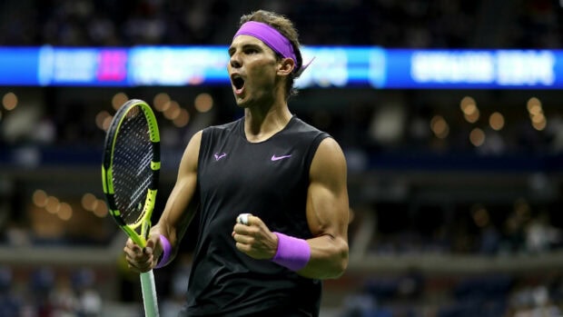 Rafael Nadal celebrating an intense moment during a tennis match, HD Desktop Wallpaper