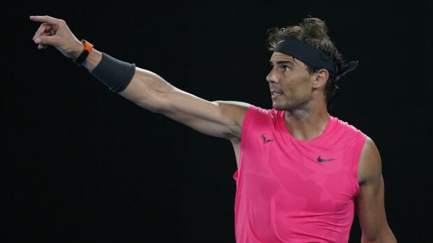 Rafael Nadal is pointing with focus during a tennis match, 2K Desktop Wallpaper