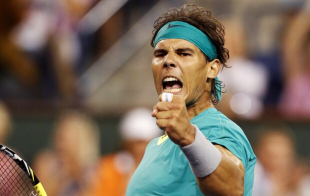 Rafael Nadal shows intense emotion during a tennis match, 2K Desktop Wallpaper